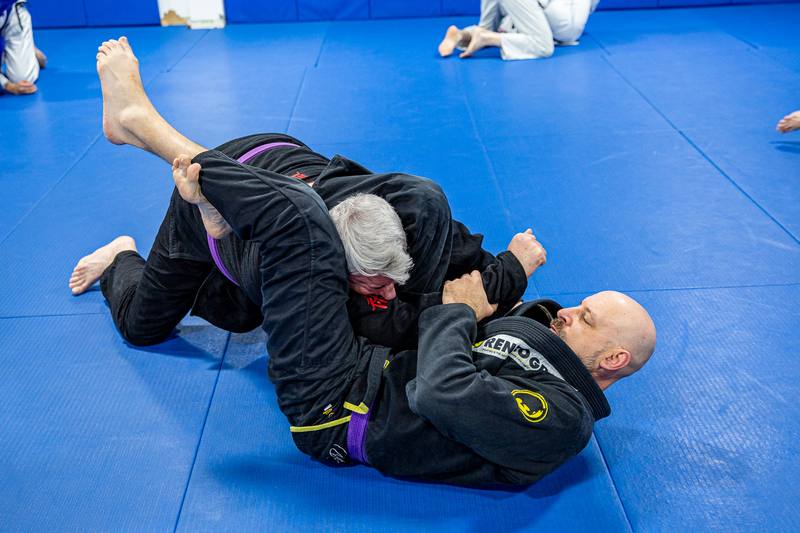 Two adult students training Brazilian jiu jitsu at Renzo Gracie Jiu Jitsu Academy Milford, CT