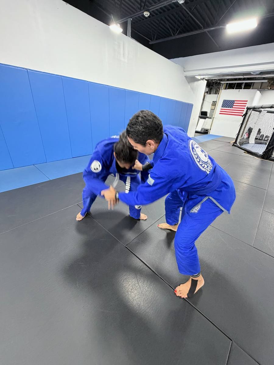 Kids drilling technique with a partner in the kids class at Renzo Gracie Milford